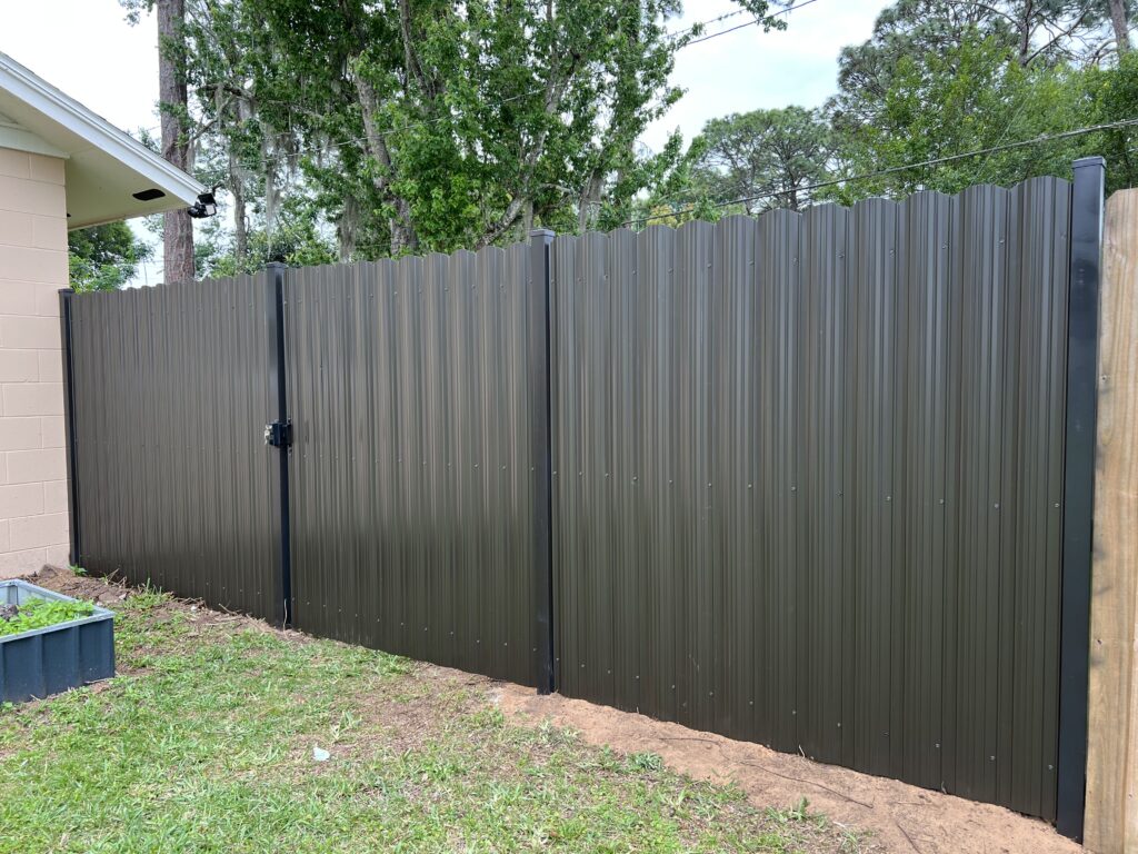 Dura Fence as a dark grey with matching gate